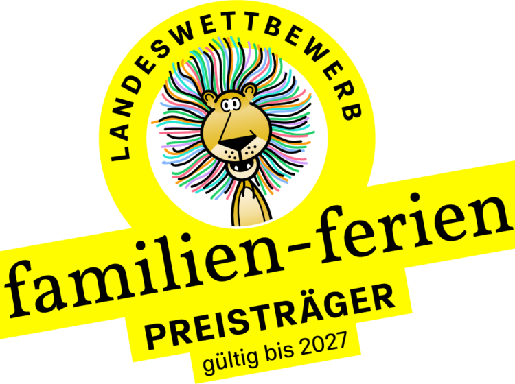 Familien Ferien Logo in gelb